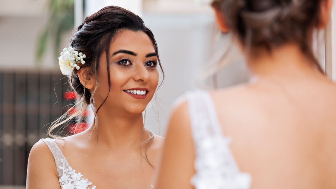 Bride Looking in Mirror